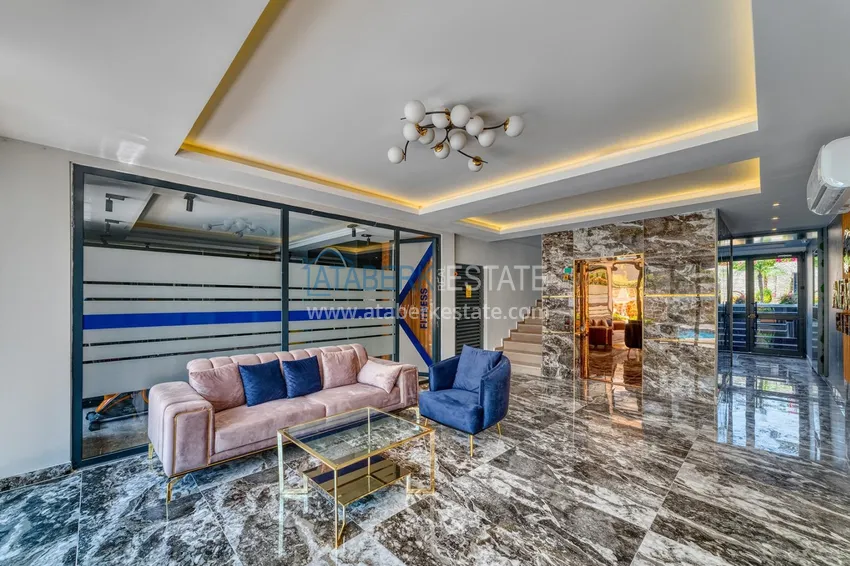 Apartament z 1 sypialnią i pięknym wykończeniem w dzielnicy Alanya Oba 10 