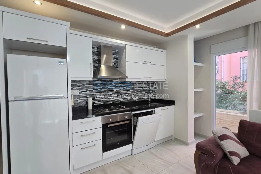 Kupuj  Jednopokojowy apartament z meblami w centrum Alanyi. Nieruchomości z zezwoleniem na pobyt 9 