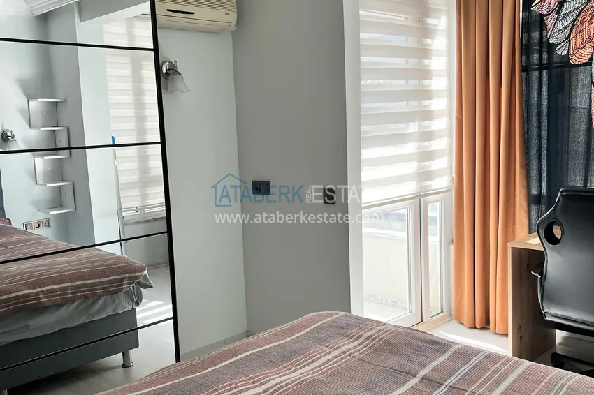 Kupuj  1+1 apartament o powierzchni 72 m2 w centrum Alanyi z nowymi meblami i dwoma balkonami - Plaża Kleopatra 11 