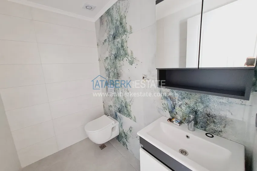 Kupuj Apartament dwupoziomowy z widokiem na morze i doskonałym wykończeniem — Alanya, dzielnica Mahmutlar 12