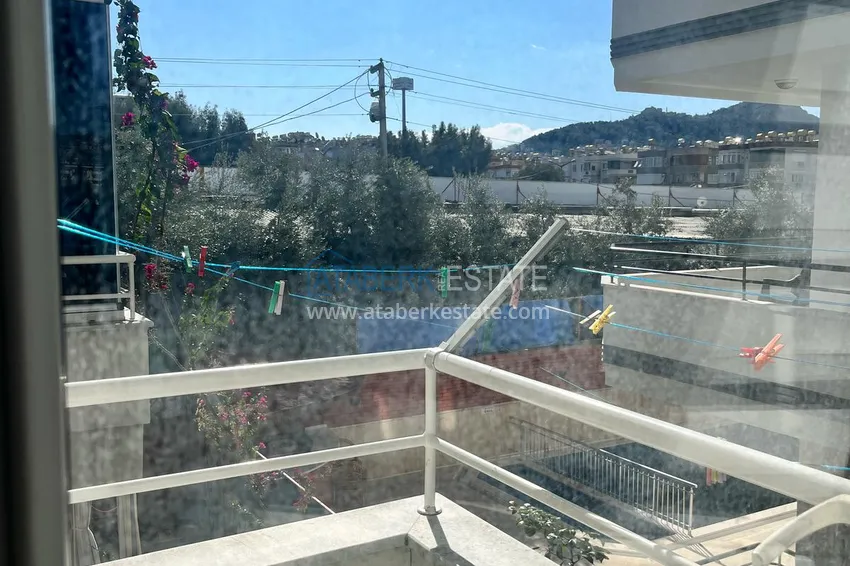 Kupuj  1+1 apartament o powierzchni 72 m2 w centrum Alanyi z nowymi meblami i dwoma balkonami - Plaża Kleopatra 12 