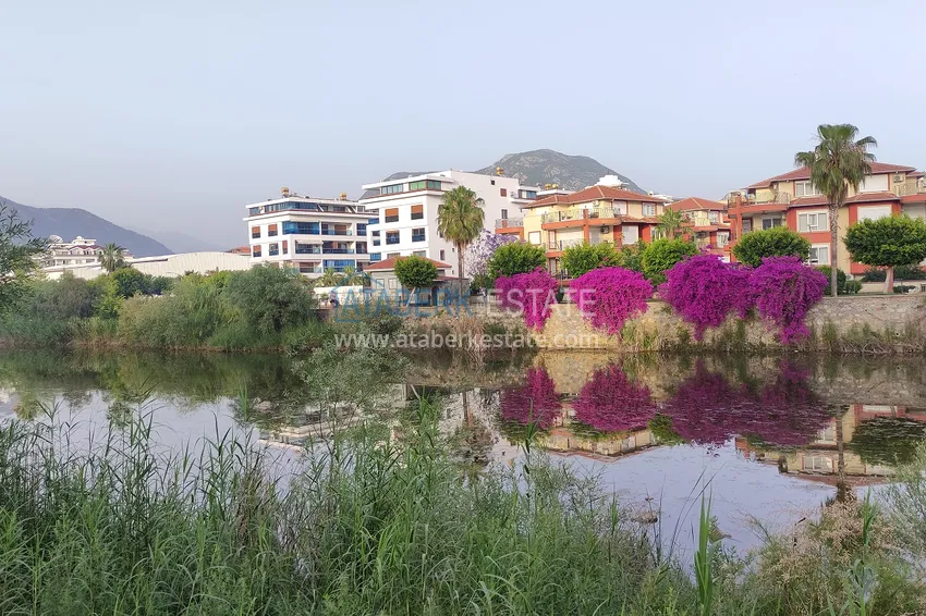 Nieruchomość na zezwolenie na pobyt. Apartament z 2 sypialniami z meblami i widokiem na rzekę Dim — Alanya, Tosmur 14 