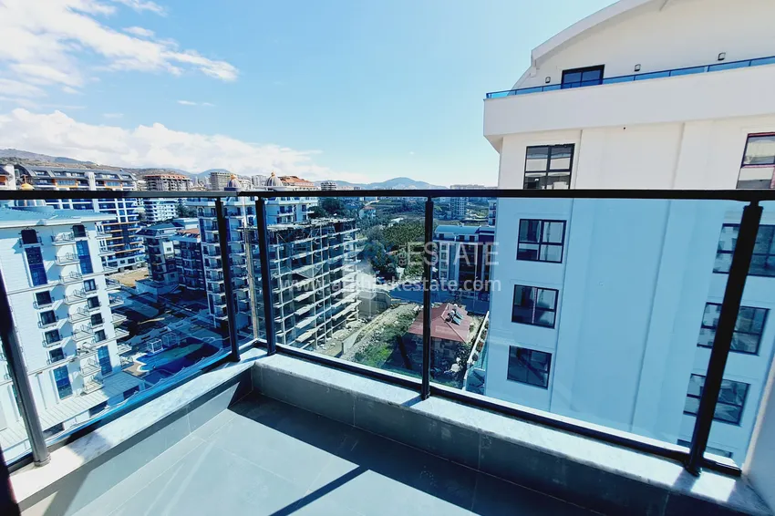 Kupuj Apartament dwupoziomowy z widokiem na morze i doskonałym wykończeniem — Alanya, dzielnica Mahmutlar 15