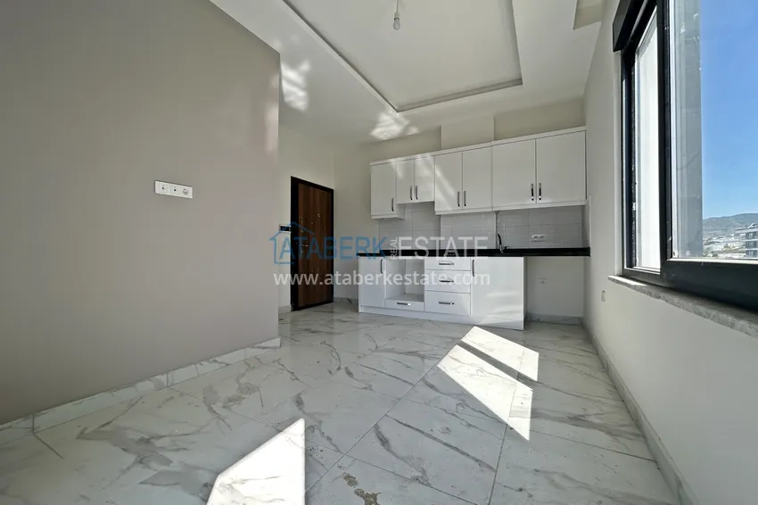 Kupuj  Płynne apartamenty 1+1 w okazyjnej cenie — Alanya, dzielnica Kargicak, 300 metrów od morza 1 