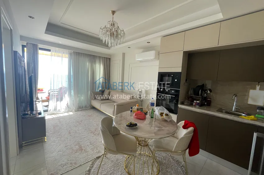 Kupuj  Apartament przy plaży z bezpośrednim widokiem na morze w Alanya, dzielnica Mahmutlar 1 