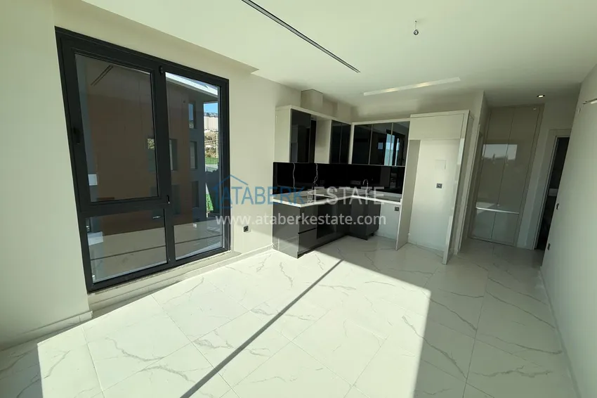 Kupuj  Dobrze wykończony apartament z jedną sypialnią w komfortowej rezydencji — dzielnica Kargicak, Alanya 1 