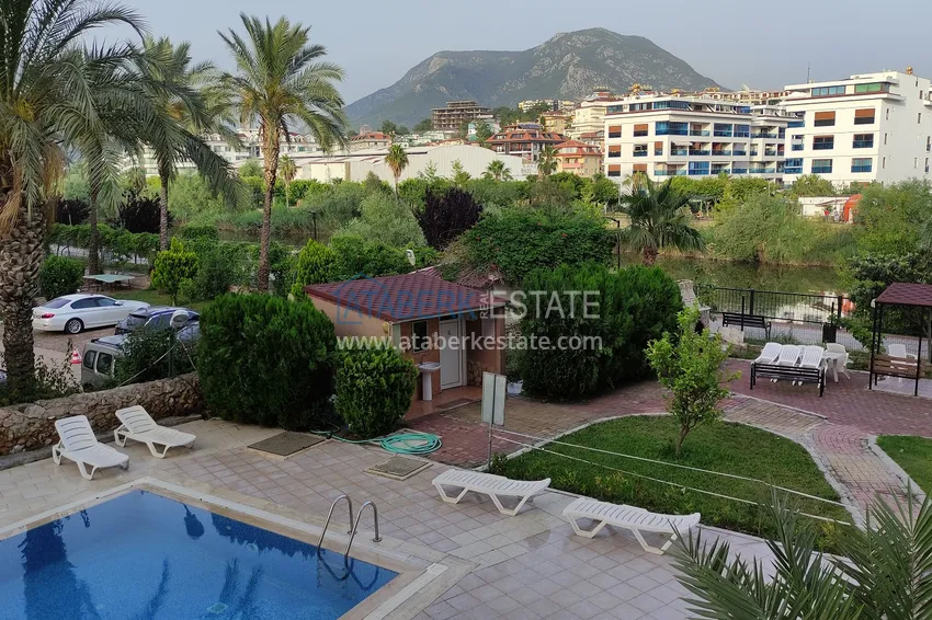 Kupuj  Nieruchomość na zezwolenie na pobyt. Apartament z 2 sypialniami z meblami i widokiem na rzekę Dim — Alanya, Tosmur 17 