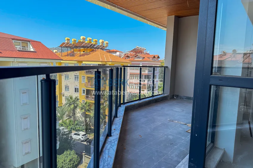 Kupuj  Panoramiczny dwupoziomowy penthouse 4+1 w centrum Alanyi — pierwszy nadbrzeżny, odpowiedni dla obywatelstwa 25 