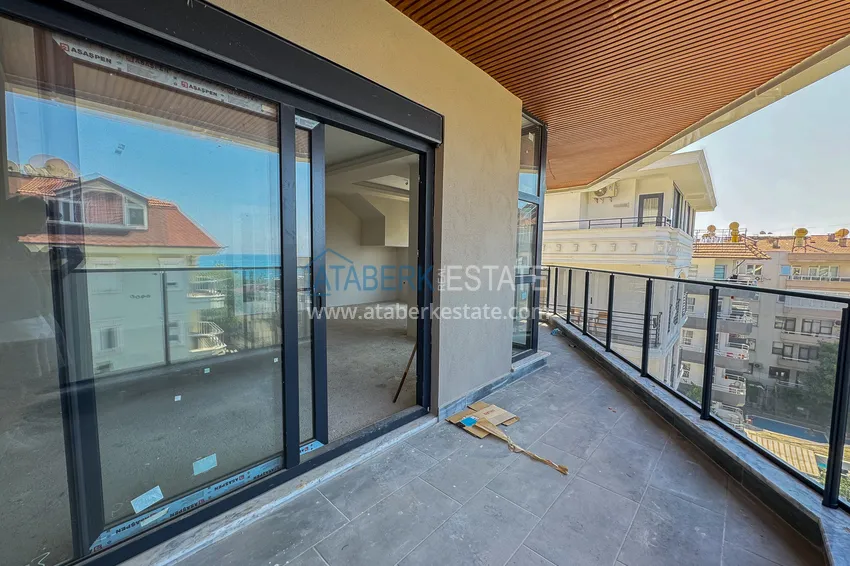 Kupuj  Panoramiczny dwupoziomowy penthouse 4+1 w centrum Alanyi — pierwszy nadbrzeżny, odpowiedni dla obywatelstwa 27 