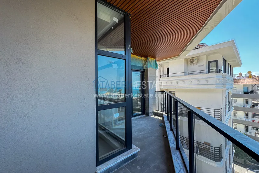 Kupuj  Panoramiczny dwupoziomowy penthouse 4+1 w centrum Alanyi — pierwszy nadbrzeżny, odpowiedni dla obywatelstwa 28 