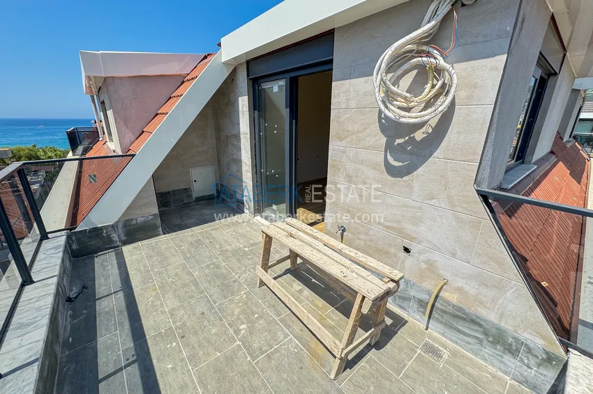 Kupuj  Panoramiczny dwupoziomowy penthouse 4+1 w centrum Alanyi — pierwszy nadbrzeżny, odpowiedni dla obywatelstwa 30 