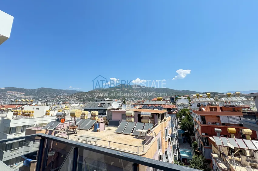 Kupuj  Panoramiczny dwupoziomowy penthouse 4+1 w centrum Alanyi — pierwszy nadbrzeżny, odpowiedni dla obywatelstwa 32 