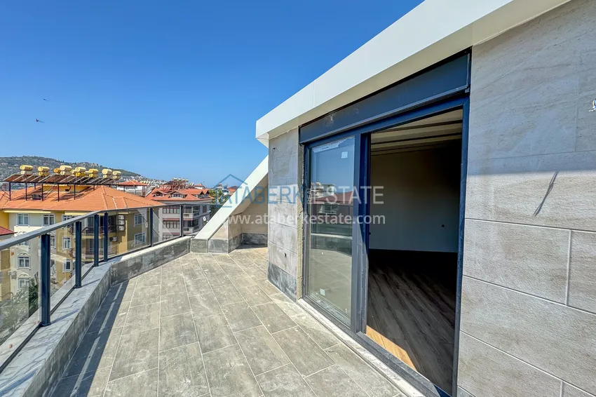 Kupuj  Panoramiczny dwupoziomowy penthouse 4+1 w centrum Alanyi — pierwszy nadbrzeżny, odpowiedni dla obywatelstwa 33 
