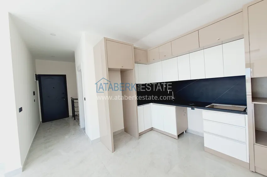 Kupuj Apartament dwupoziomowy z widokiem na morze i doskonałym wykończeniem — Alanya, dzielnica Mahmutlar 2