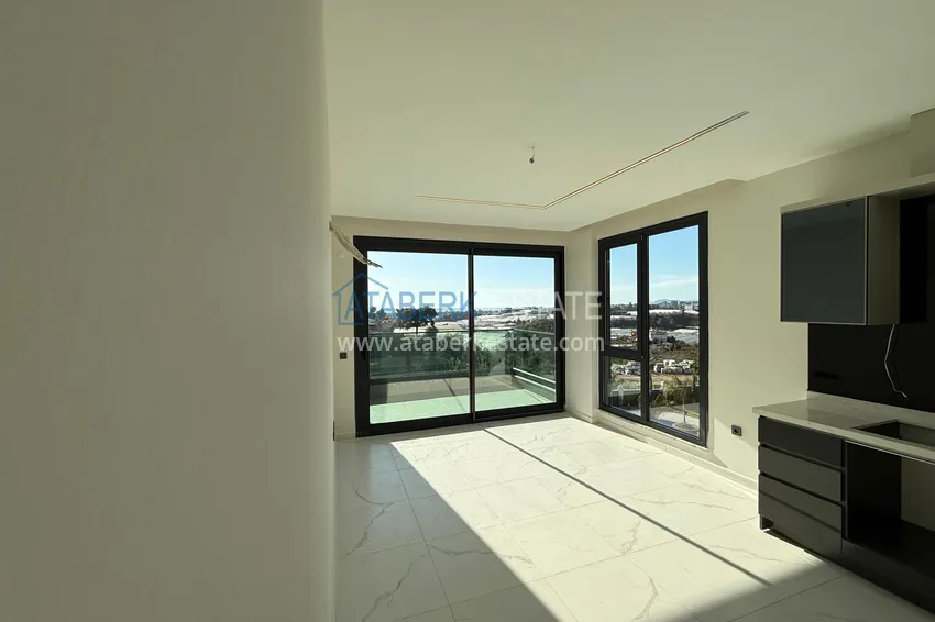 Kupuj  Dobrze wykończony apartament z jedną sypialnią w komfortowej rezydencji — dzielnica Kargicak, Alanya 2 