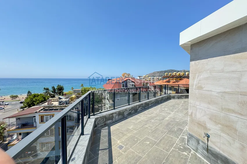Kupuj  Panoramiczny dwupoziomowy penthouse 4+1 w centrum Alanyi — pierwszy nadbrzeżny, odpowiedni dla obywatelstwa 34 