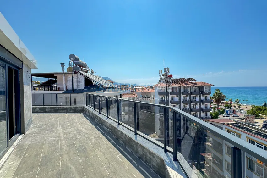 Kupuj  Panoramiczny dwupoziomowy penthouse 4+1 w centrum Alanyi — pierwszy nadbrzeżny, odpowiedni dla obywatelstwa 36 