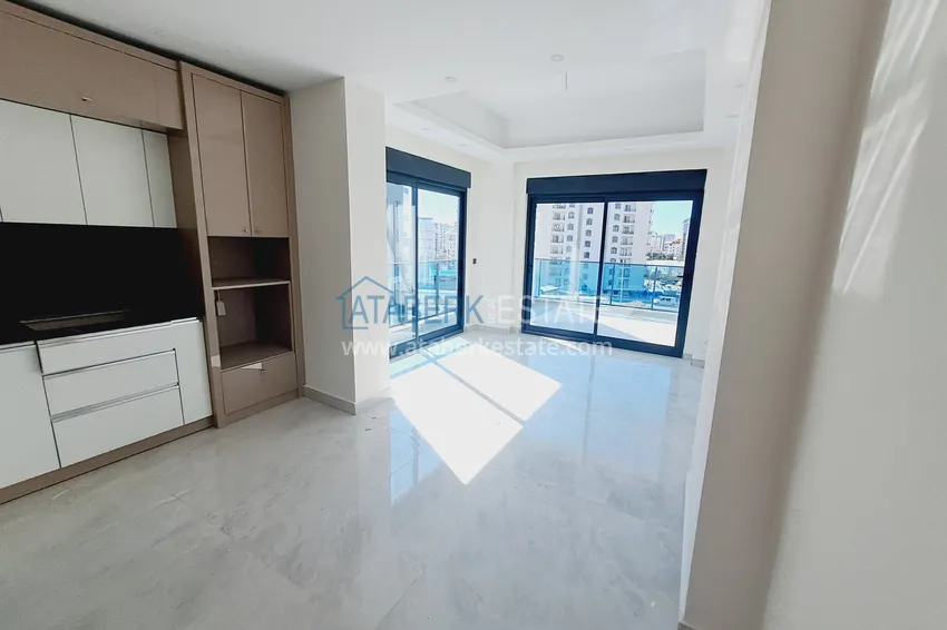 Kupuj  Apartamenty w Alanyi w segmencie komfortowej rezydencji - dzielnica Mahmutlar  15 