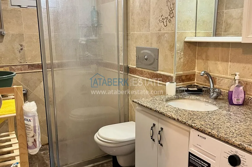 Kupuj  1+1 apartament o powierzchni 72 m2 w centrum Alanyi z nowymi meblami i dwoma balkonami - Plaża Kleopatra 3 