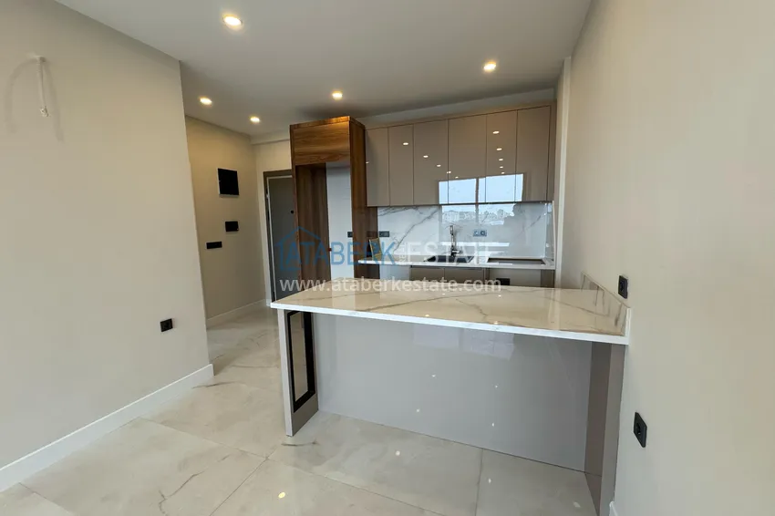 Kupuj  🔥 Nasz projekt! Apartamenty w centrum Alanyi, 450 metrów od Plaży Kleopatry 12 