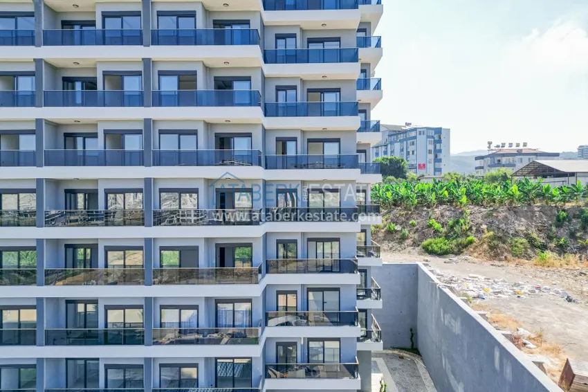 Dobrze wykończony apartament z 1 sypialnią z widokiem na morze i góry w Alanyi, dzielnica Mahmutlar  4 
