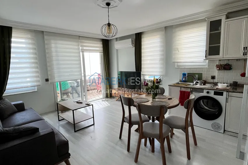 Kupuj  1+1 apartament o powierzchni 72 m2 w centrum Alanyi z nowymi meblami i dwoma balkonami - Plaża Kleopatra 5 