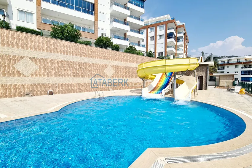Apartament 2+1 z meblami i widokiem na morze — luksusowy kompleks w Kargicak 7 