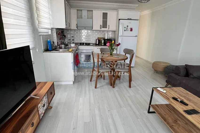 Kupuj  1+1 apartament o powierzchni 72 m2 w centrum Alanyi z nowymi meblami i dwoma balkonami - Plaża Kleopatra 6 