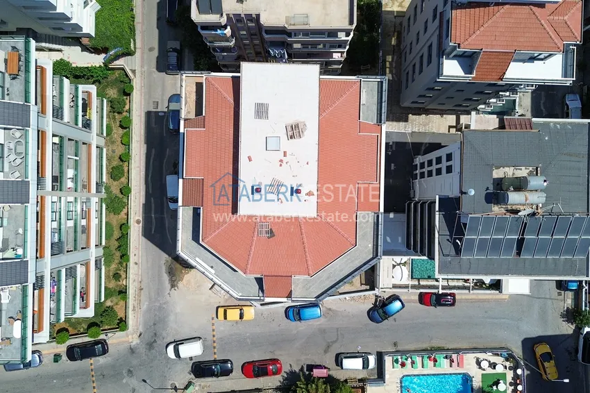 Panoramiczny dwupoziomowy penthouse 4+1 w centrum Alanyi — pierwszy nadbrzeżny, odpowiedni dla obywatelstwa 7 