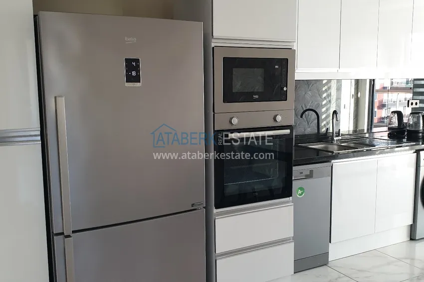 Kupuj  Apartament 4+1 z designerskimi wnętrzami i widokami — Alanya, dzielnica Mahmutlar 12 