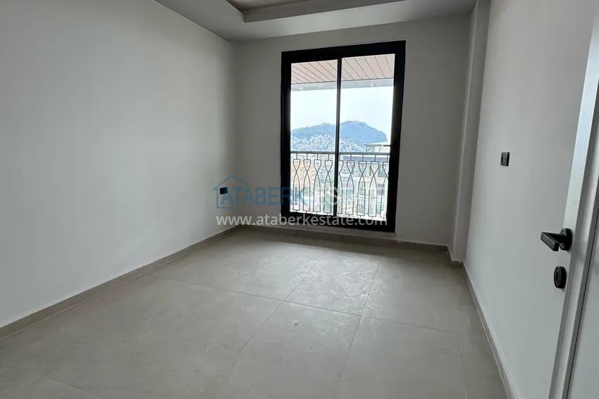 Kupuj Dwupoziomowy penthouse z widokiem na Calais w sercu Alanyi 11 