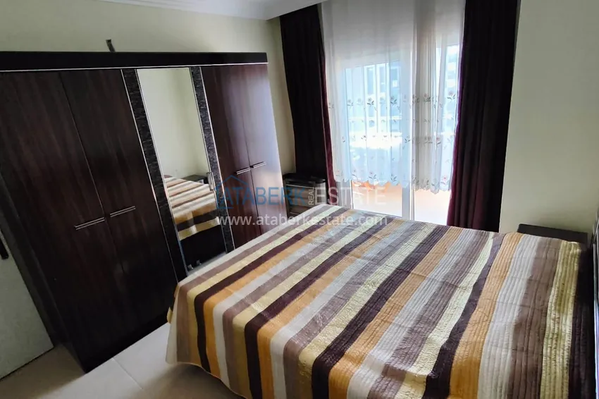Kupuj  Apartament 1+1 o powierzchni 76 m2 umeblowany w komfortowym kompleksie — Alanya, dzielnica Mahmutlar 10 