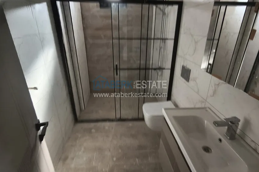 Kupuj  Apartament 1+1 z wysokiej jakości wykończeniem — Mersin, dzielnica Arpachbakhshish 11 