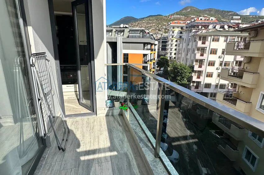 Kupuj  Apartament 2+1 z meblami, oddzielną kuchnią i widokiem na góry - Centrum Alanya  13 