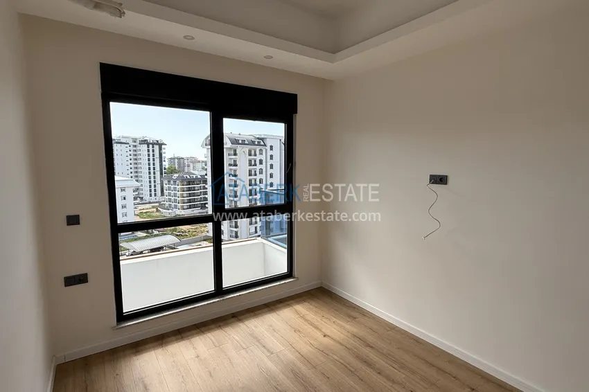 Kupuj  Nowoczesny apartament z dwiema sypialniami i widokiem na góry w kompleksie mieszkalnym na poziomie hotelu, Mahmutlar - Alanya 12 