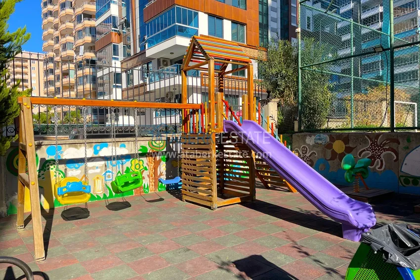 Apartament pod klucz 2+1 z przeszklonym balkonem — Alanya, dzielnica Mahmutlar 12 