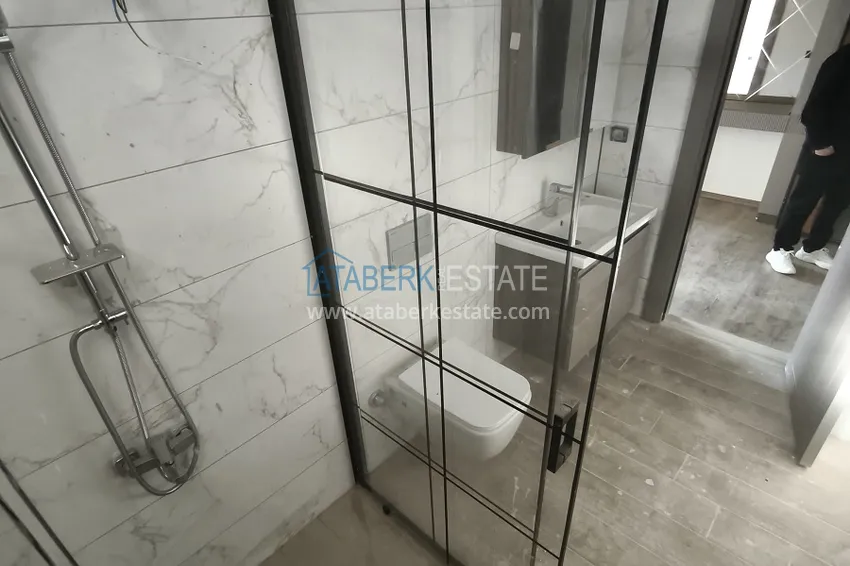Kupuj  Apartament 1+1 z wysokiej jakości wykończeniem — Mersin, dzielnica Arpachbakhshish 12 