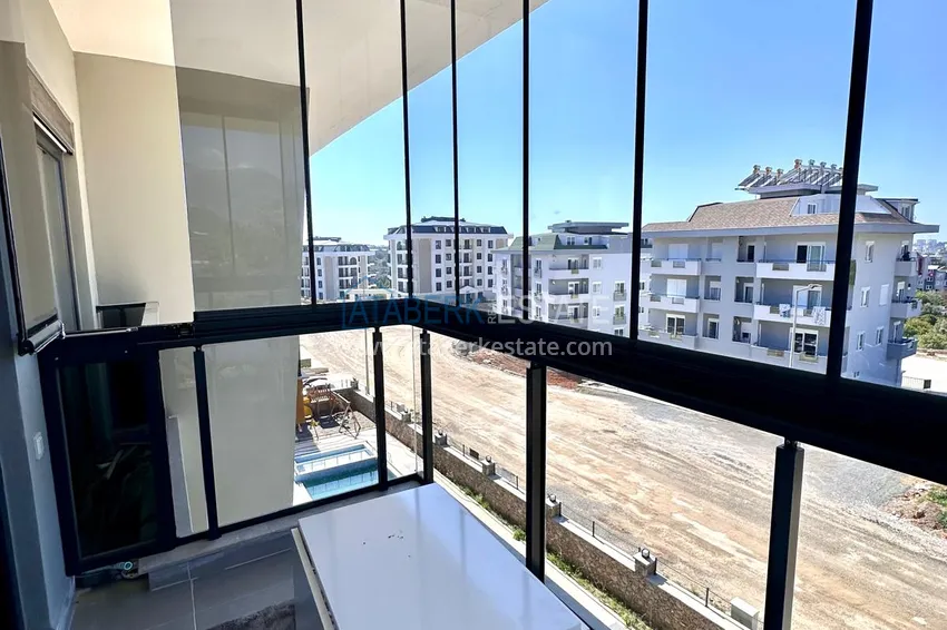 Kupuj  Apartament 1+1 z nowymi meblami i przeszklonym balkonem w nowym budynku — Alanya, dzielnica Górna Oba 12 