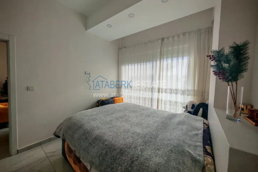 Kupuj  1+1 mieszkanie z meblami i działką w kompleksie mieszkalnym - Alanya, dzielnica Avsallar 13 