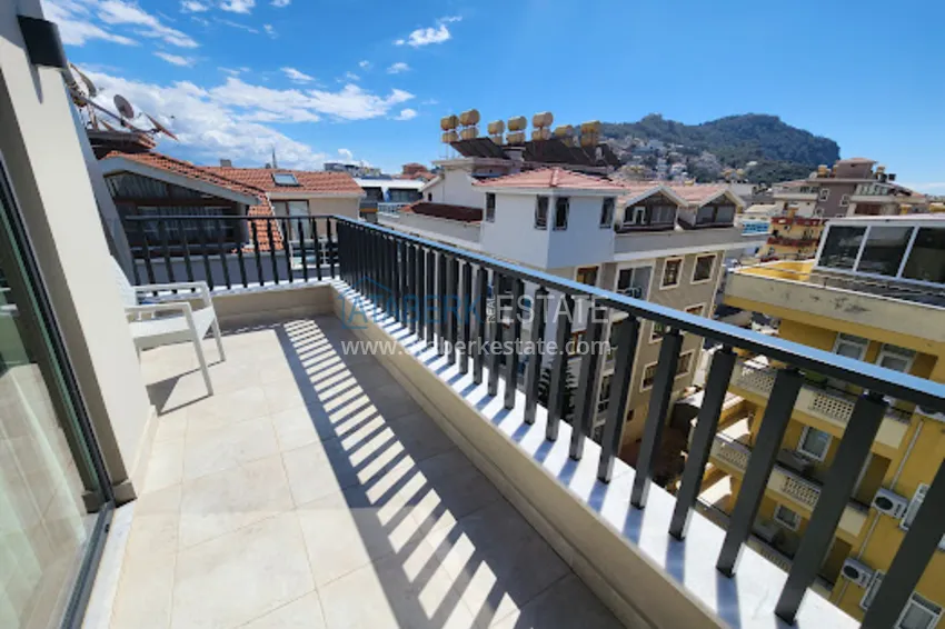 Kupuj  Umeblowany dwupoziomowy penthouse zaledwie 200 metrów od plaży Cleopatra - Centrum Alanya 13 