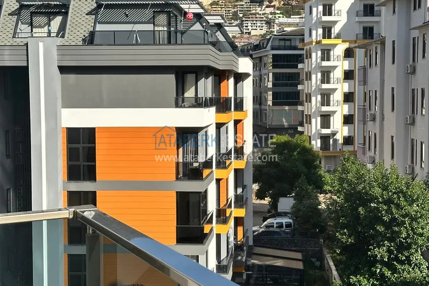 Kupuj  Apartament 2+1 z meblami, oddzielną kuchnią i widokiem na góry - Centrum Alanya  14 