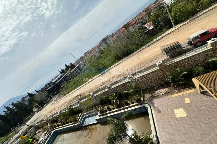 Kupuj  Penthouse 1+1 z pięknym wykończeniem w elitarnym kompleksie — centrum Alanyi, dzielnica Buyuk Hasbahce  15 