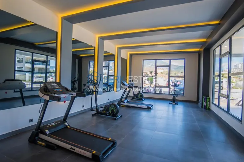 Apartament 4+1 z designerskimi wnętrzami i widokami — Alanya, dzielnica Mahmutlar 14 