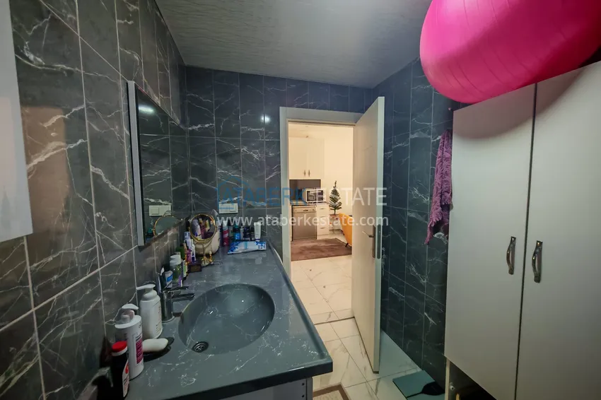 Kupuj  1+1 mieszkanie z meblami i działką w kompleksie mieszkalnym - Alanya, dzielnica Avsallar 17 