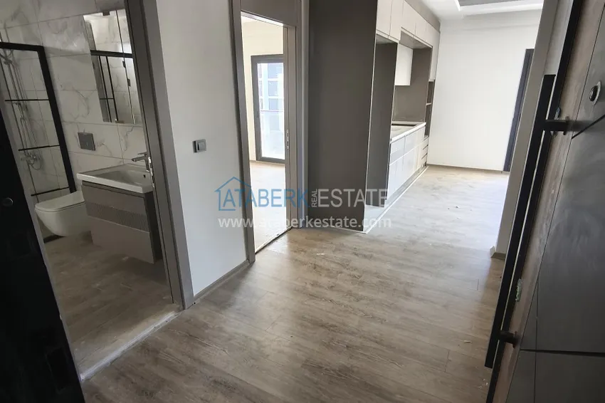 Kupuj  Apartament 1+1 z wysokiej jakości wykończeniem — Mersin, dzielnica Arpachbakhshish 1 