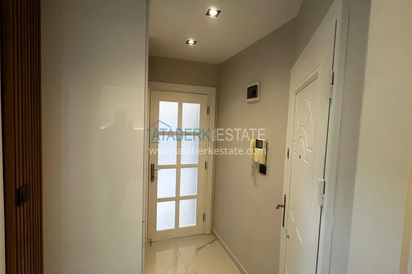Kupuj Nowo odnowiony apartament z jedną sypialnią w centrum Alanyi — nadaje się na zezwolenie na pobyt 1 