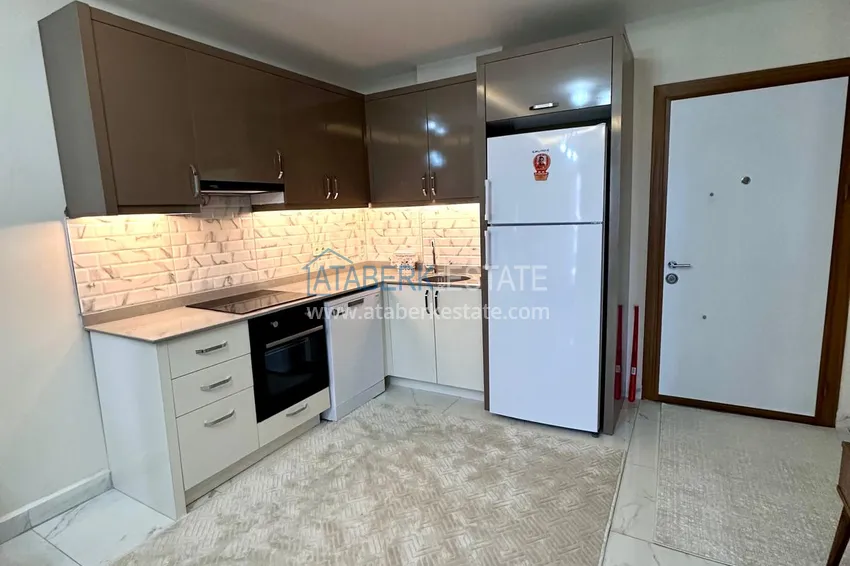 Kupuj  Apartament 1+1 z nowymi meblami i przeszklonym balkonem w nowym budynku — Alanya, dzielnica Górna Oba 1 