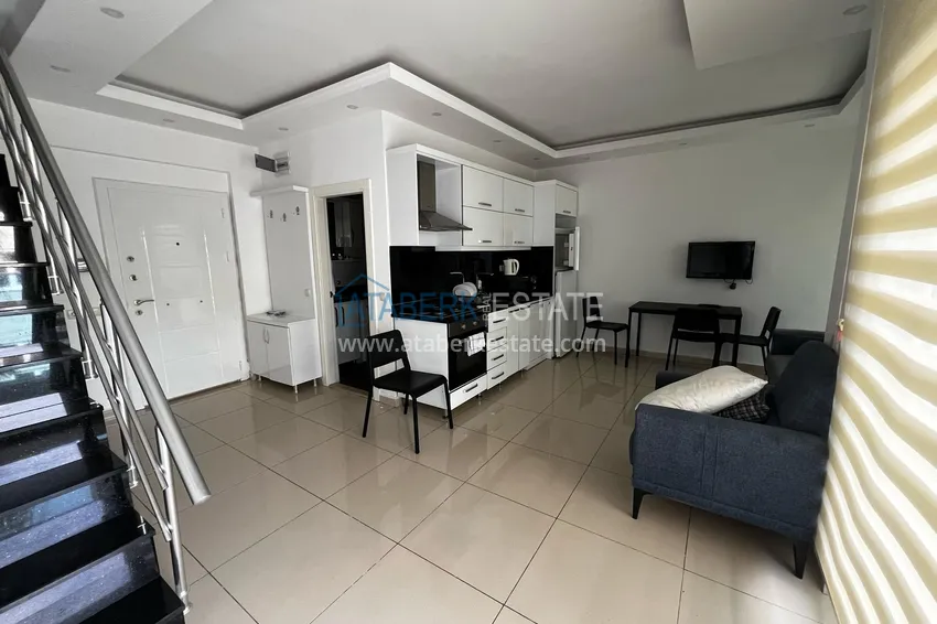 Kupuj Umeblowany dwupoziomowy penthouse w centrum Alanyi - Plaża Kleopatra 1 