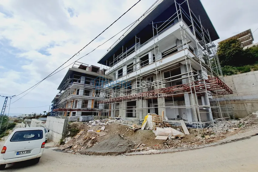 Zdjęcie -  Nieruchomość obywatelska w ekskluzywnym kompleksie mieszkalnym — Alanya, Bektash  1 