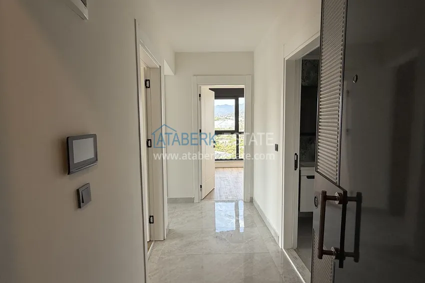 Kupuj  Nowoczesny apartament z dwiema sypialniami i widokiem na góry w kompleksie mieszkalnym na poziomie hotelu, Mahmutlar - Alanya 1 